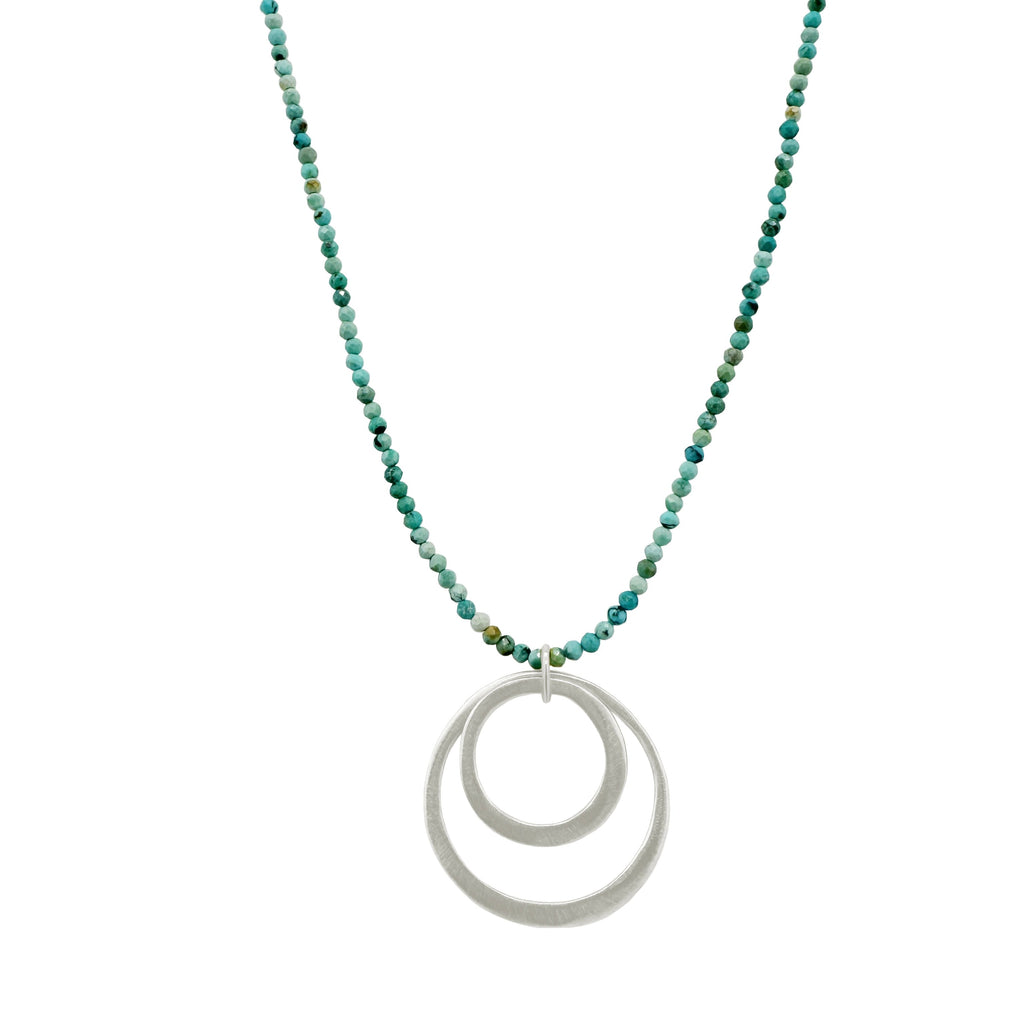 double circles on turquoise necklace in silver