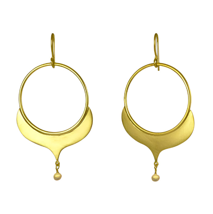 Gold hoop earrings with a small dangling ball on a light gray background
