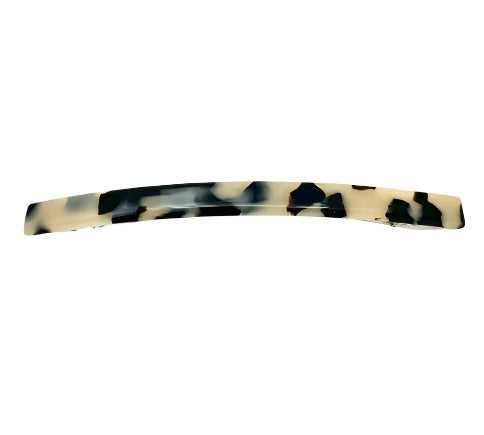 Tortoiseshell hair barrette on a white background