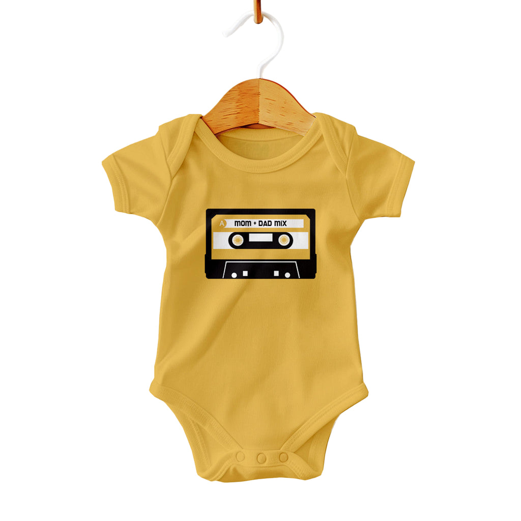 Yellow baby onesie with a cassette tape design on a white background