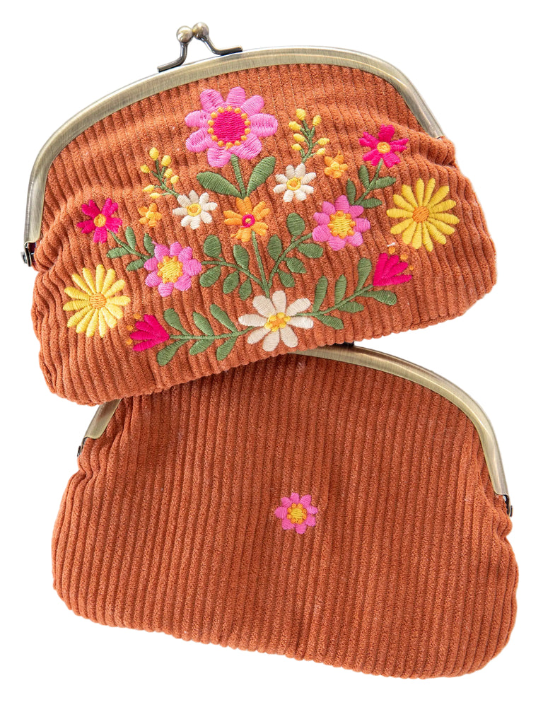 Rust colored corduroy pouches with floral embroidery 