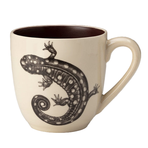 Beige mug with a black salamander design on a white background