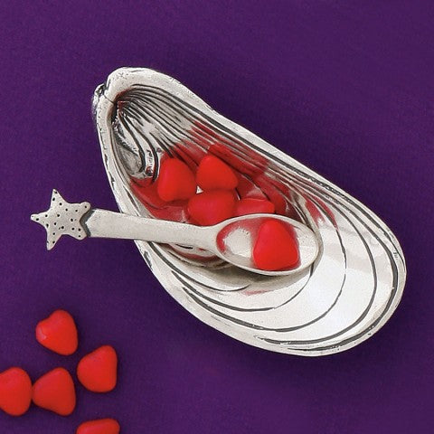 Mussel Shell Salt Cellar with Spoon on purple background