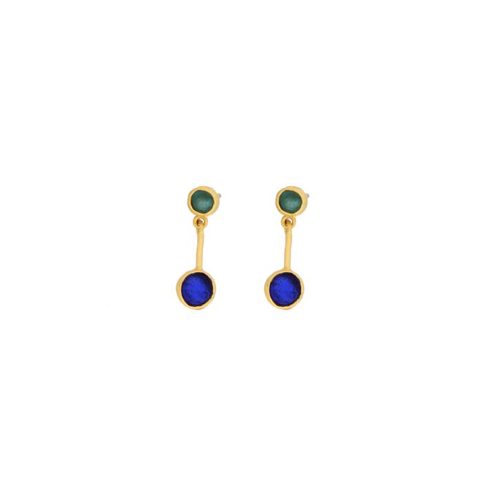 Pair of gold earrings with blue and green gemstones on a white background
