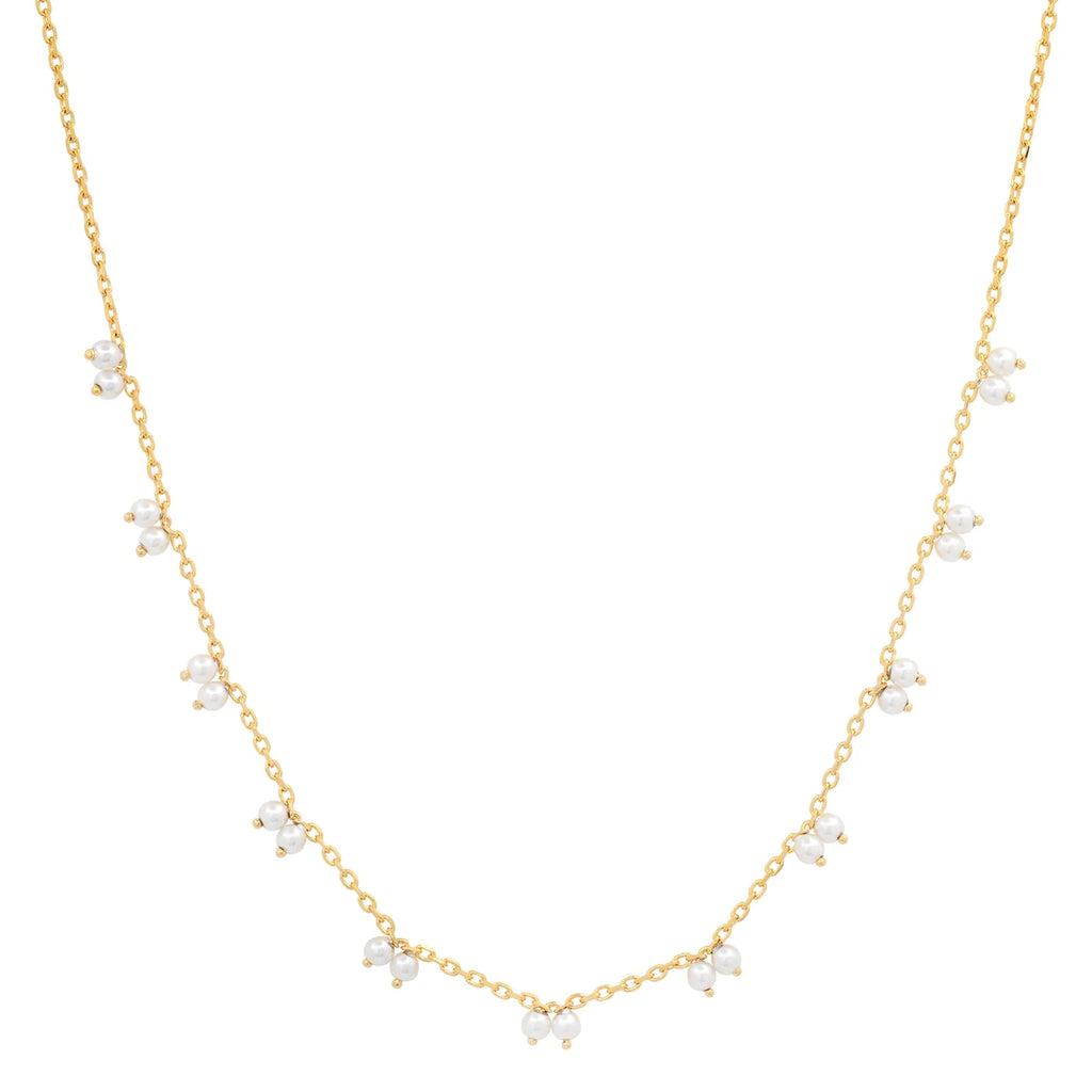 A gold vermeil chain necklace with tiny pearl stations.