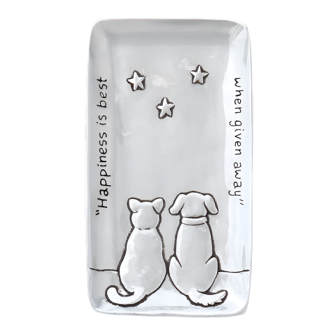 A small white tray with engravings of a cat and a dog, and the text 'Happiness is best when given away'.