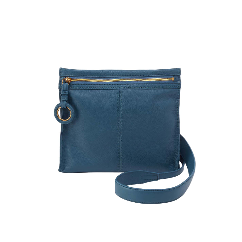 Blue crossbody bag with a strap on a white background