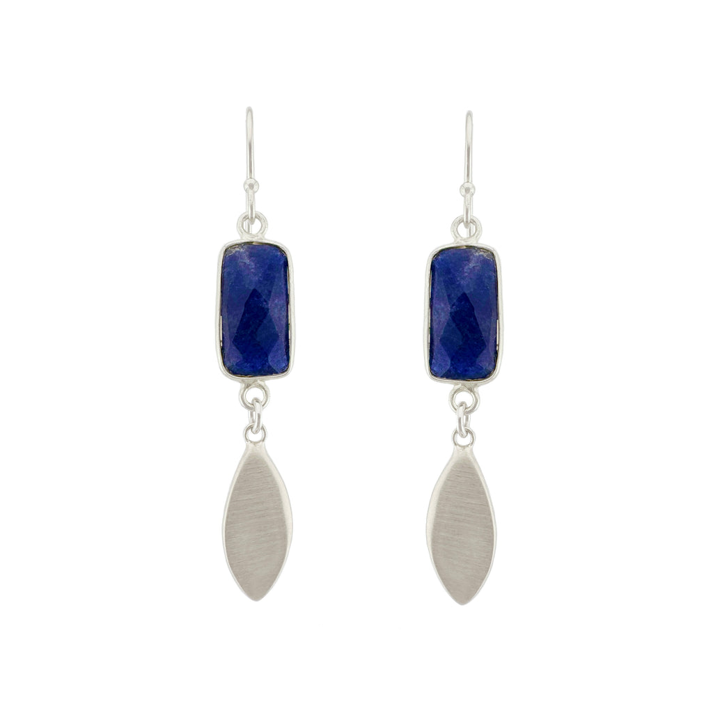 Pair of earrings with blue gemstones and silver leaves on a white background