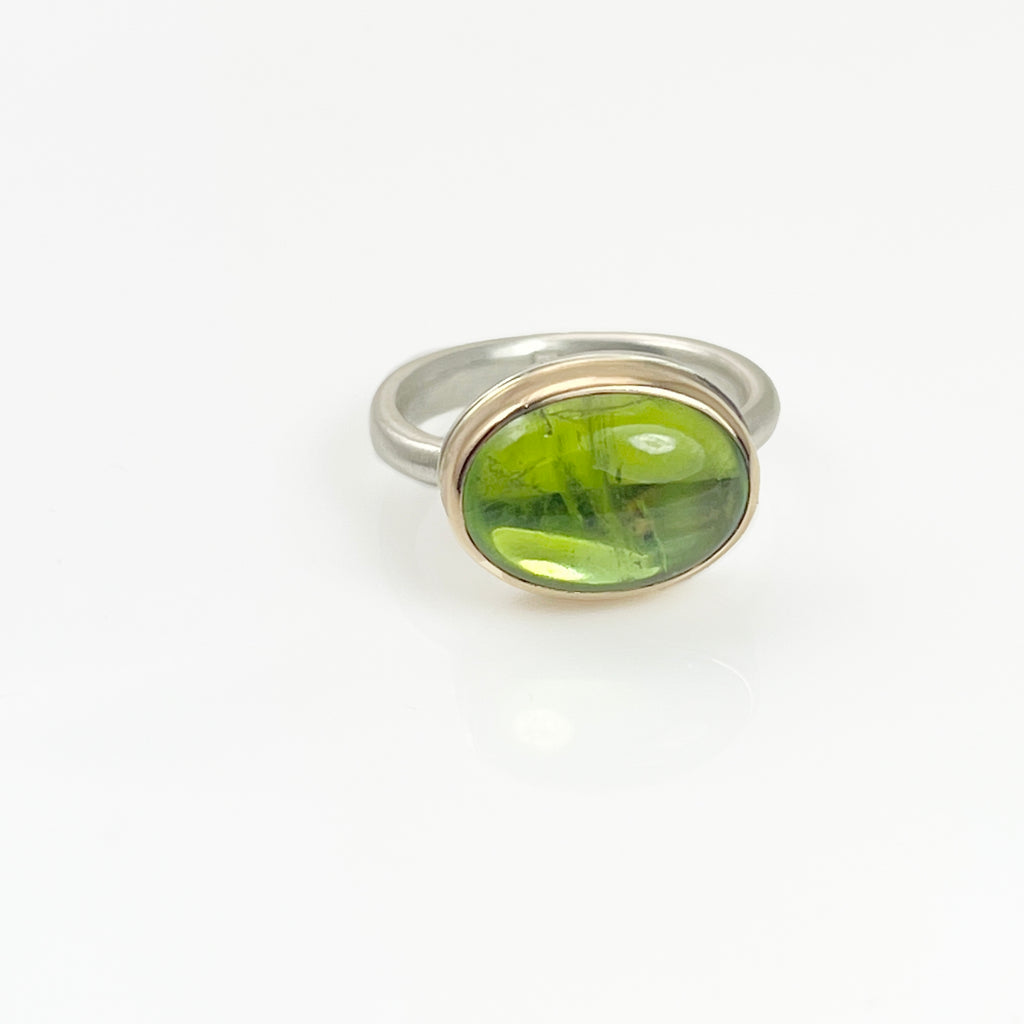 Smooth Oval Peridot Ring front facing