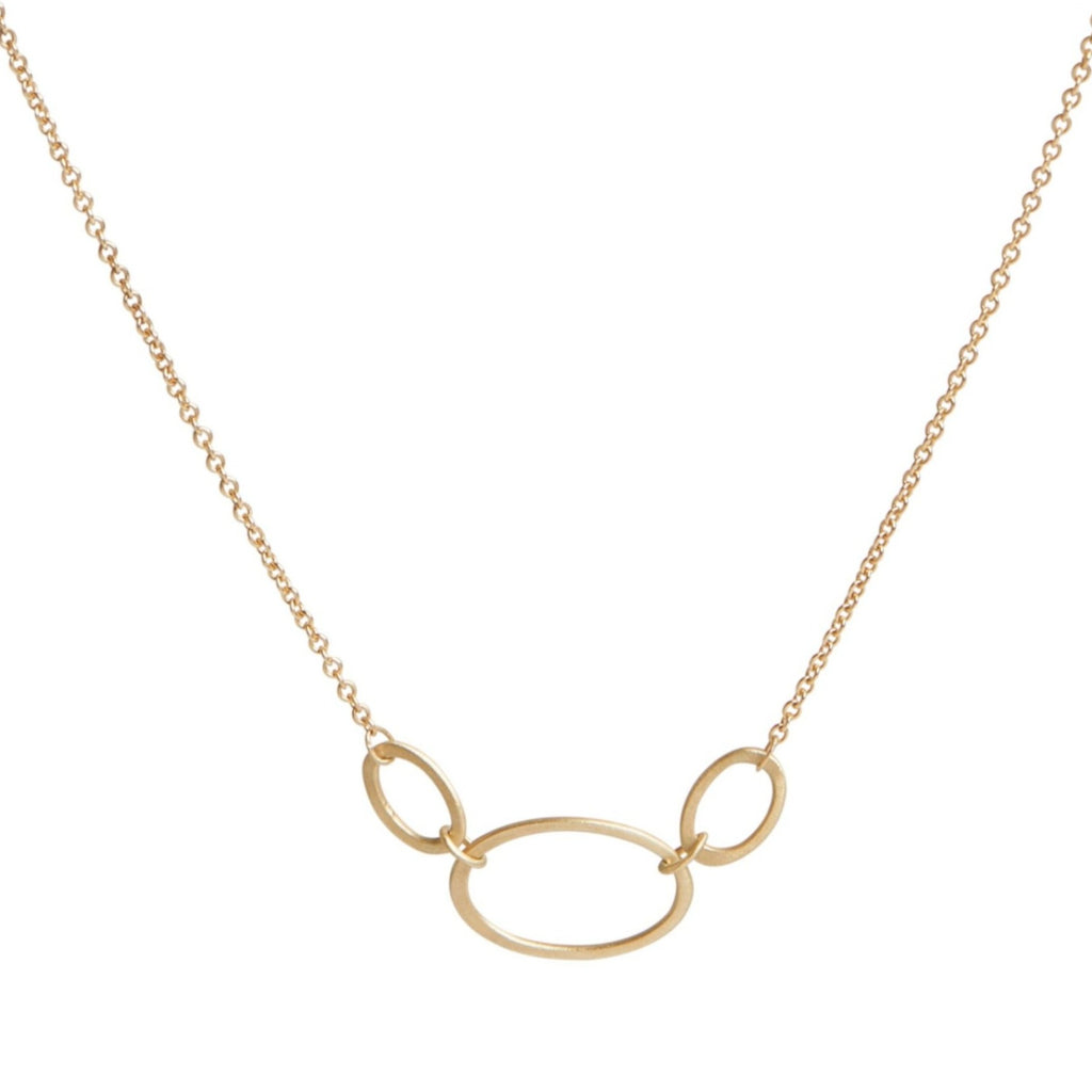 14k Gold necklace with three mini interlocking oval pendants on a white background