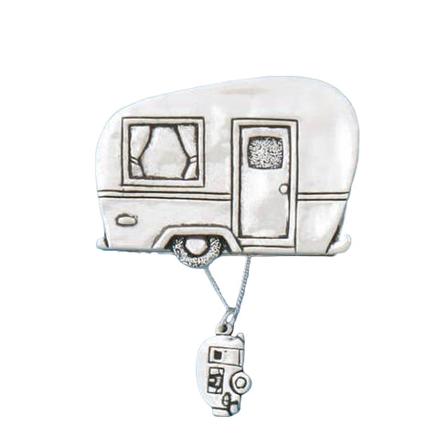 Silver trailer-shaped brooch with a pendant