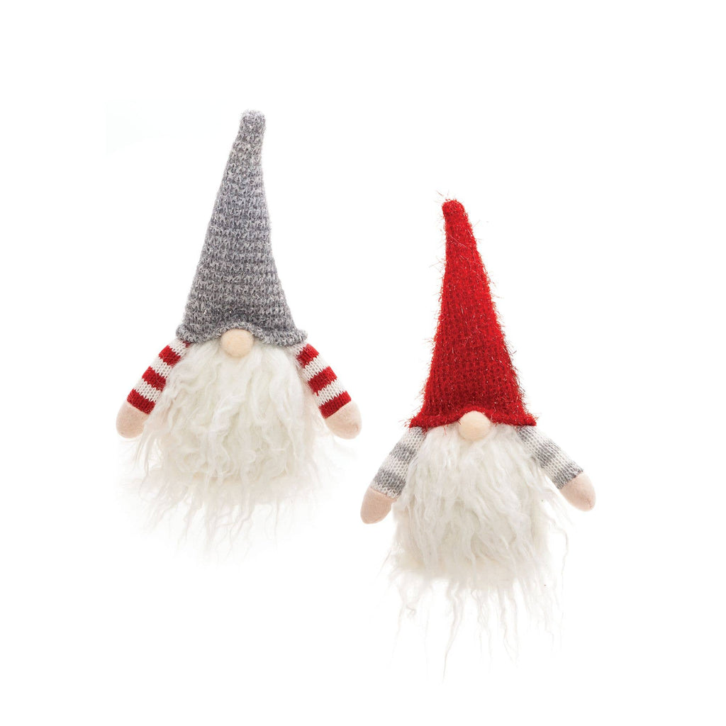 Two knitted gnomes with red and gray hats on a white background