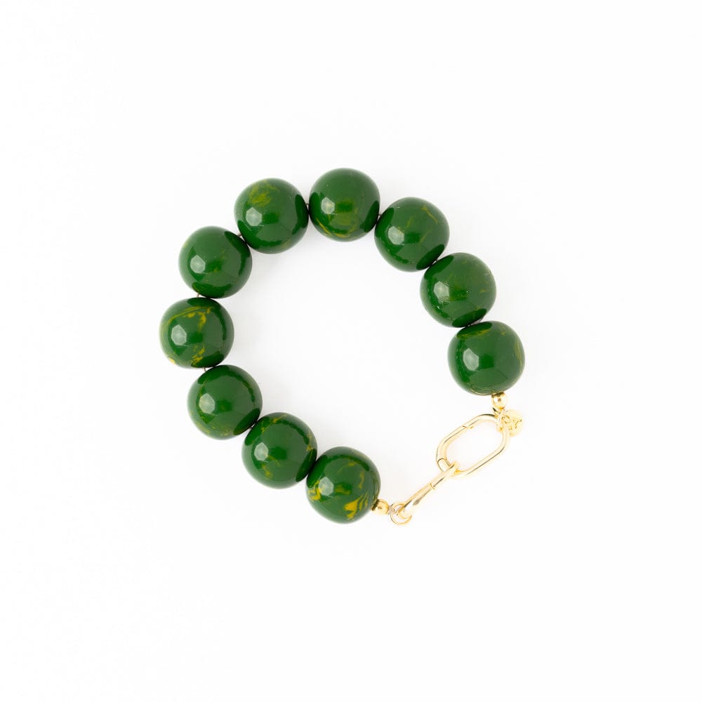 Green beaded bracelet with a gold clasp on a white background