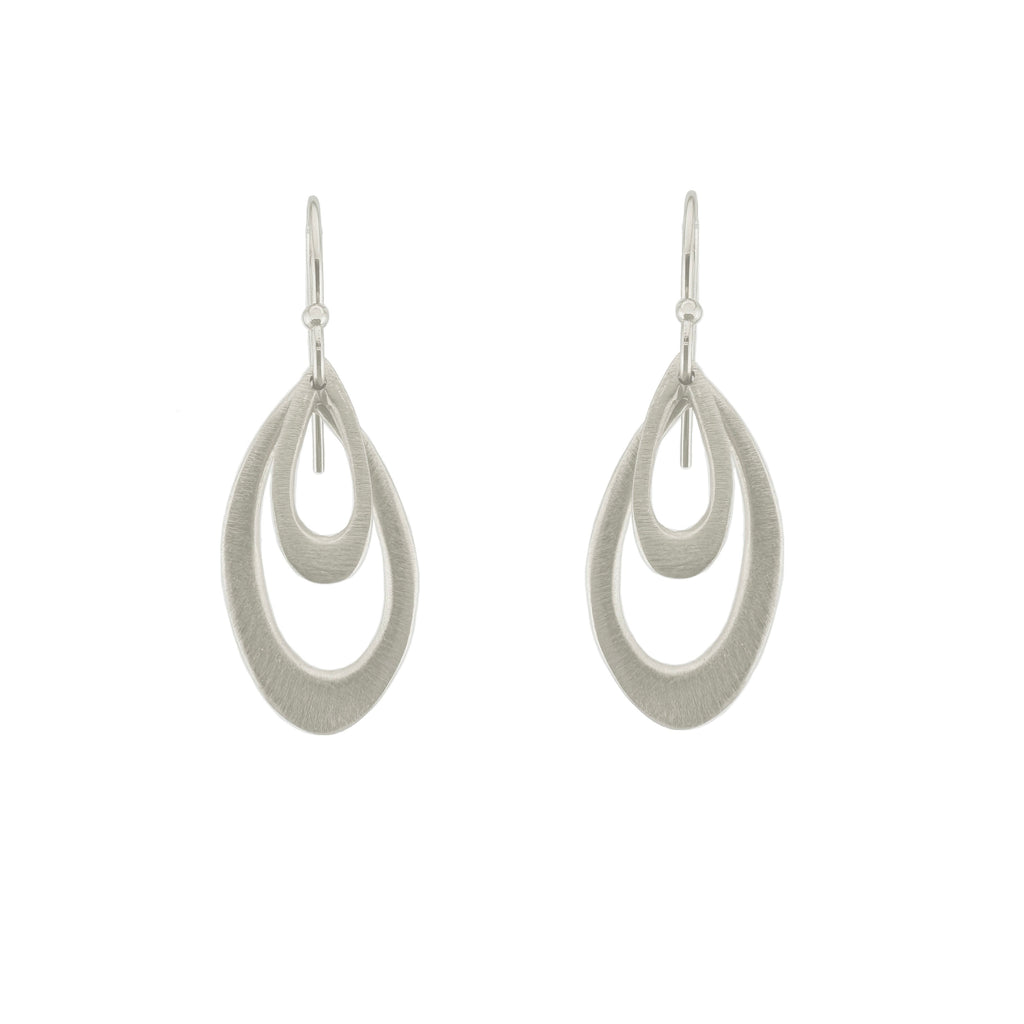 double leaf earrings in silver on a white background