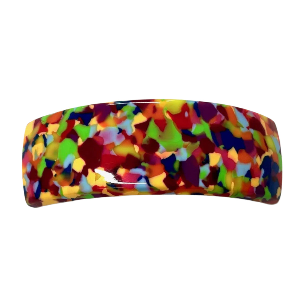 Colorful patterned hair clip on a white background