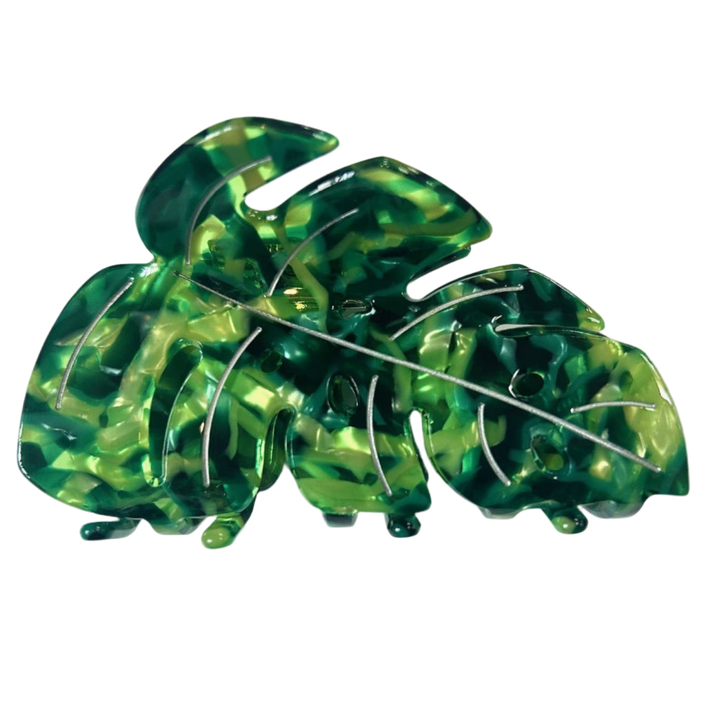 Green leaf-shaped hair clip on a white background