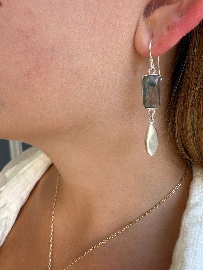 faceted stone rectangle w. leaf earrings on ear in silver