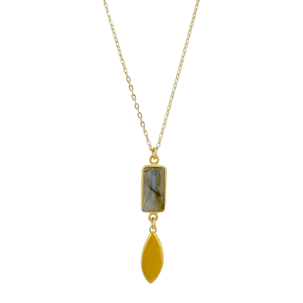 Gold necklace with a rectangular pendant and a smaller leaf pendant on a white background