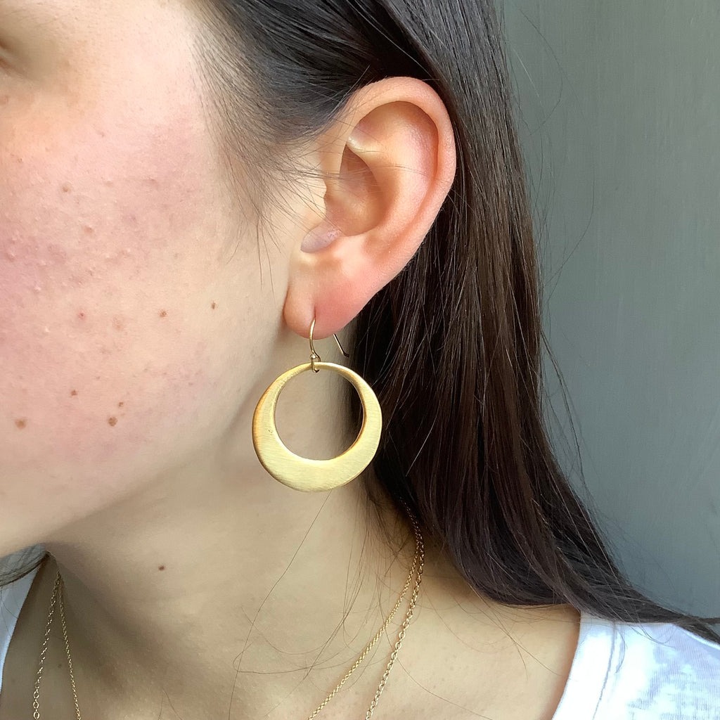 large circle earrings in vermeil on the ear