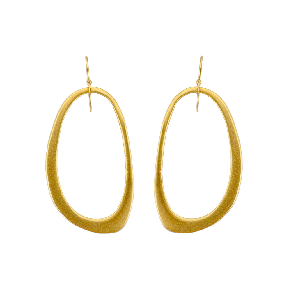 Gold hoop earrings on a white background