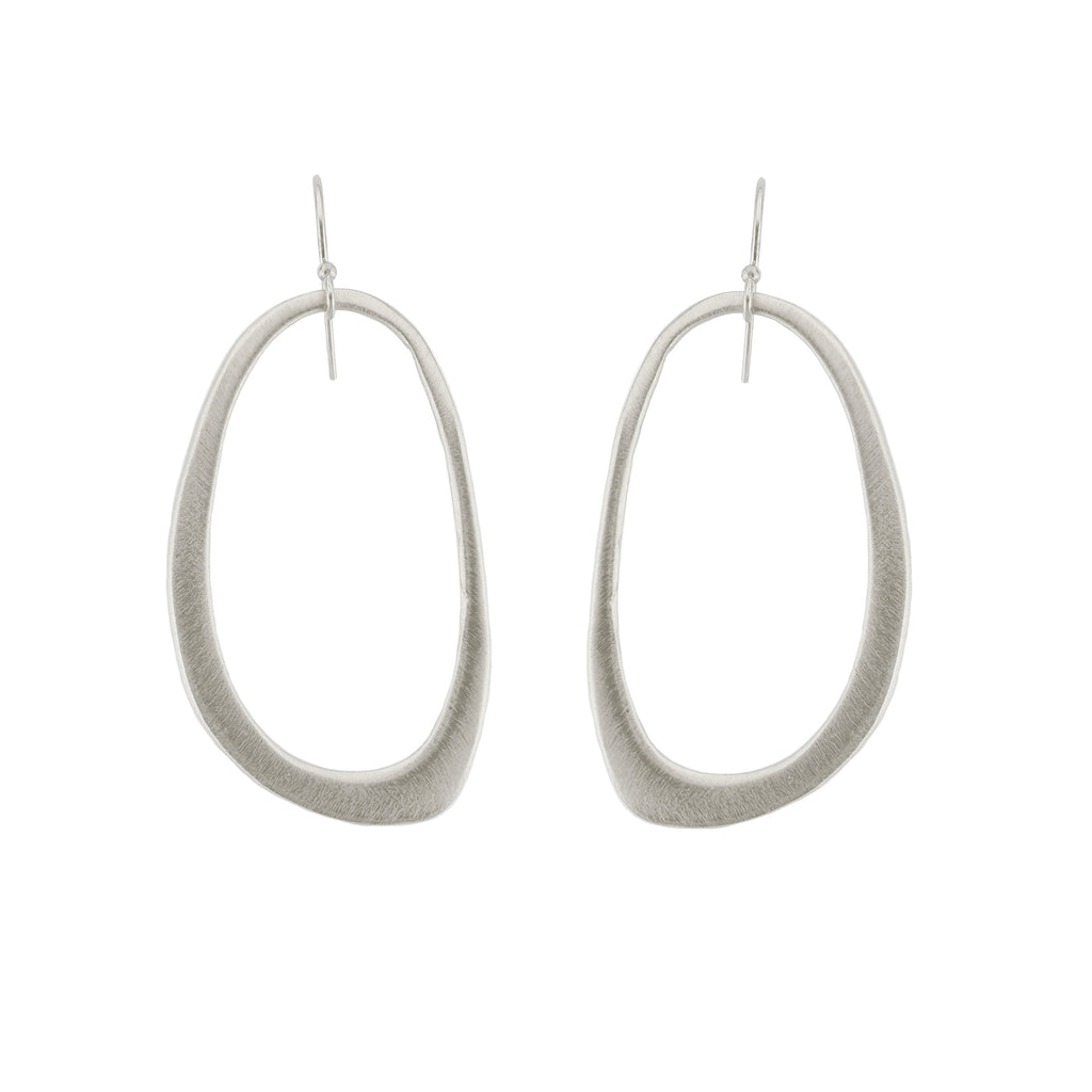 Silver hoop earrings on a white background