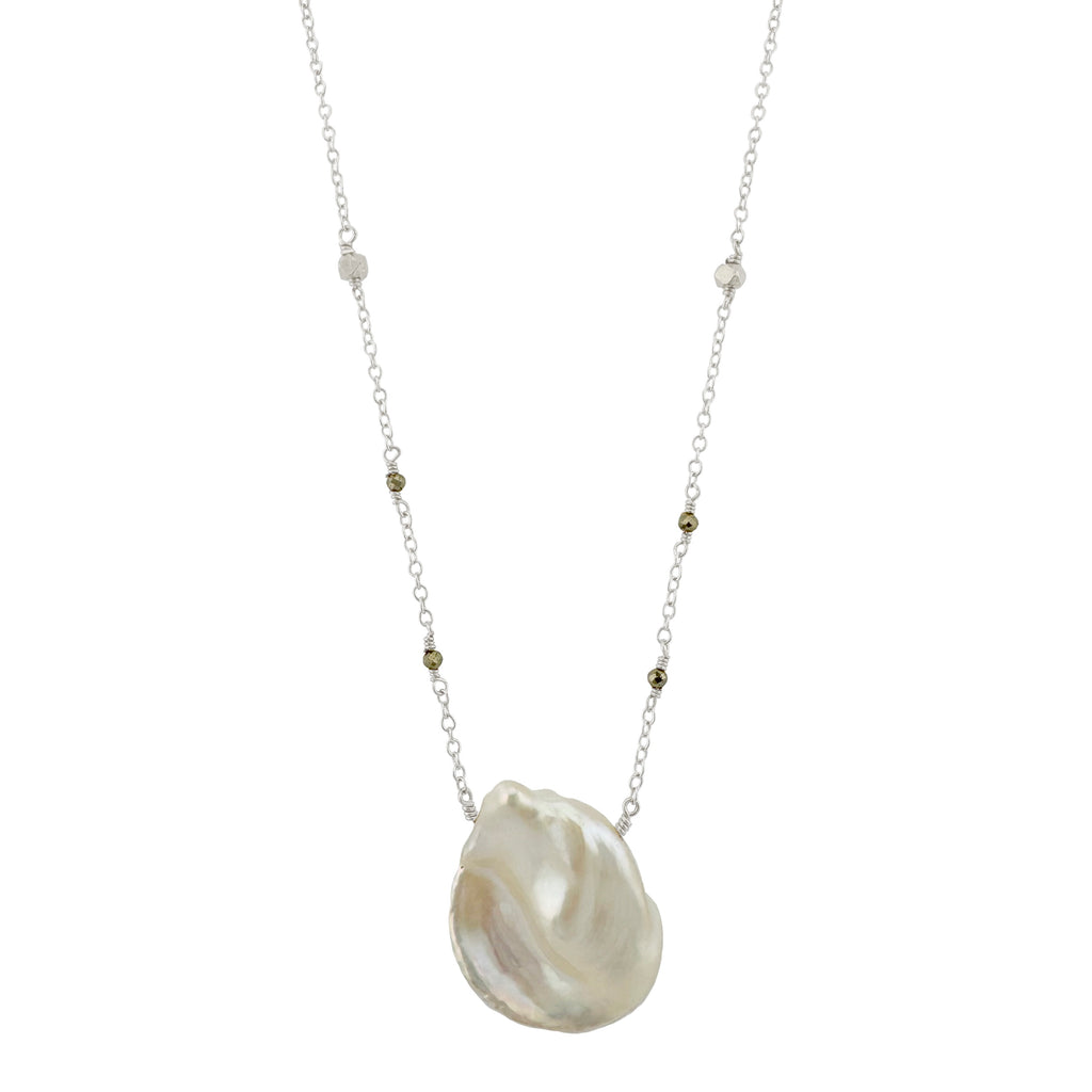 Necklace with a large pearl pendant on a white background