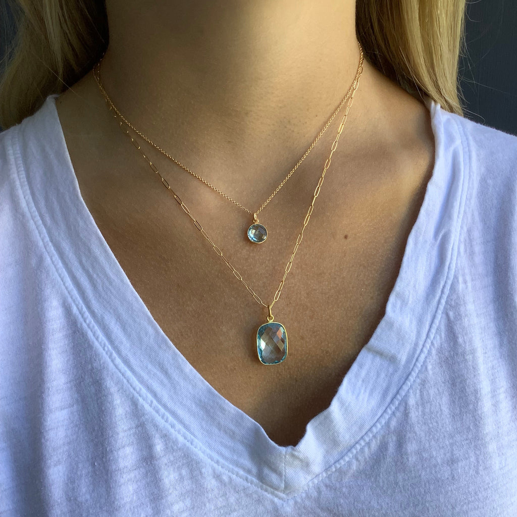 large swiss blue topaz necklace in gold vermeil on the neck