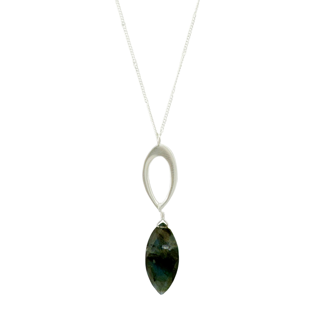 Necklace with a marquise-shaped gemstone pendant on a white background