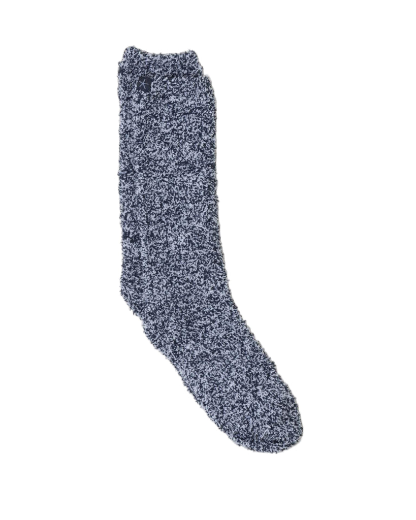 Blue textured sock on a light gray background