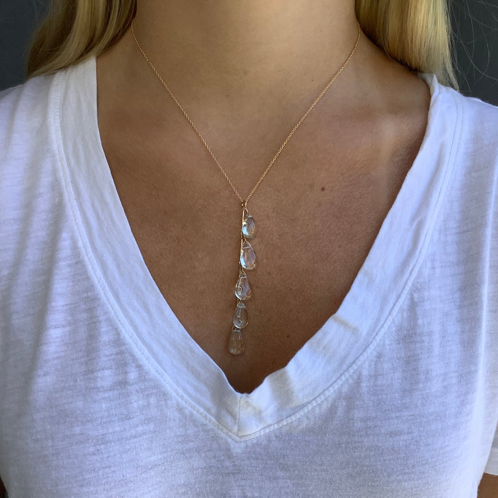 long green amethyst droplet necklace in gold fill on the neck