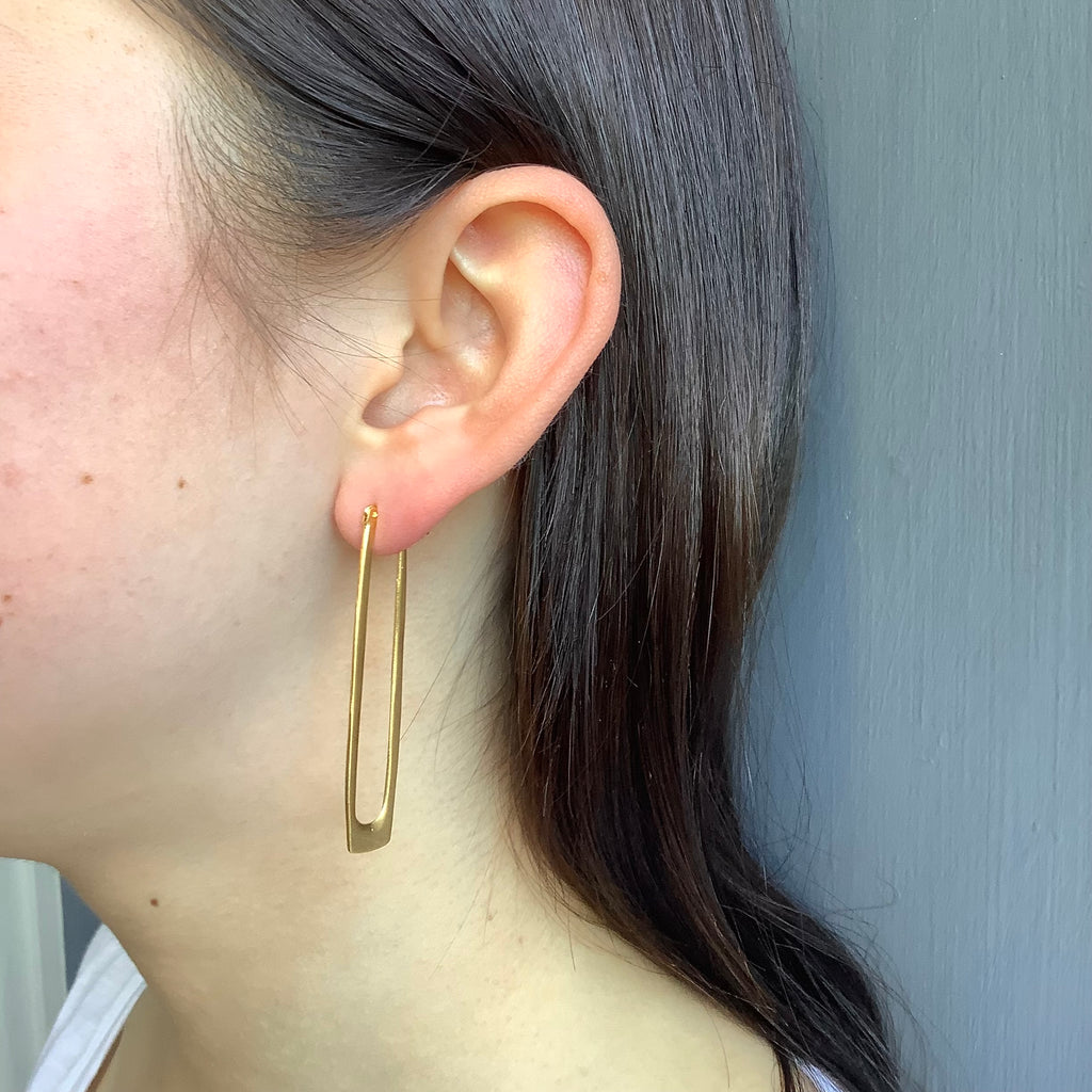 long rectangle hoops earrings in vermeil on the ear