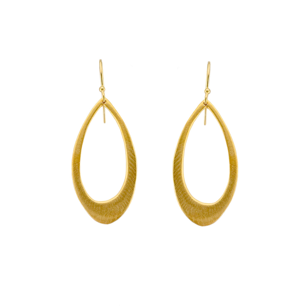 Gold hoop earrings on a white background