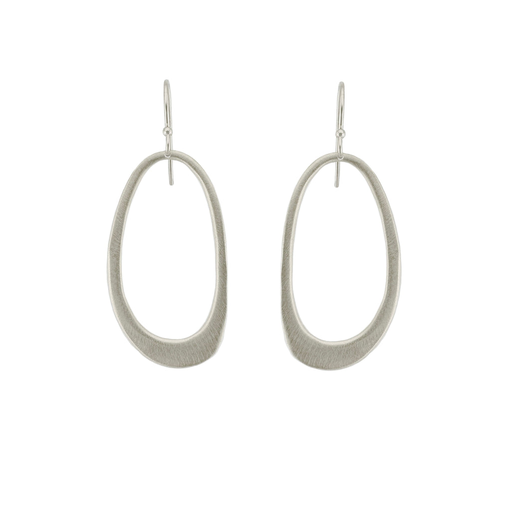 Pair of silver hoop earrings on a white background