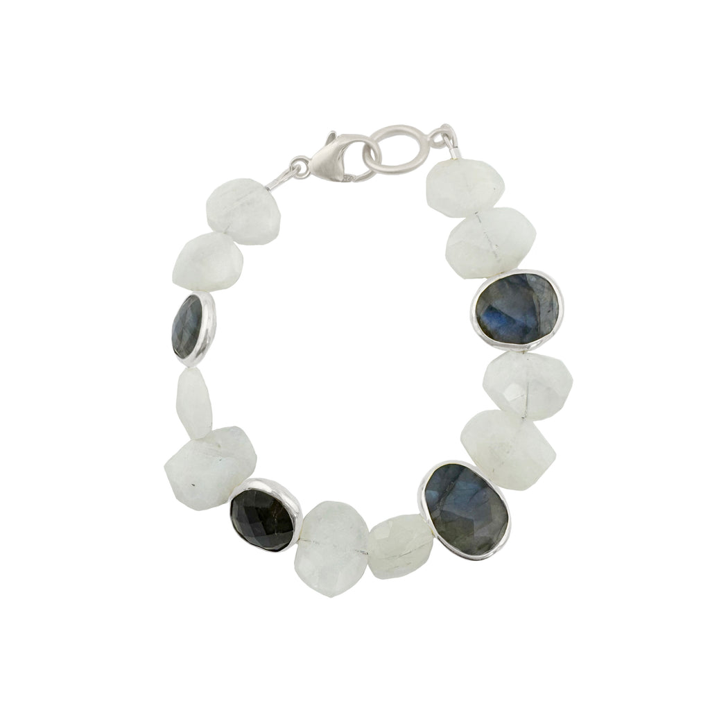 Bracelet with white and blue stones on a white background