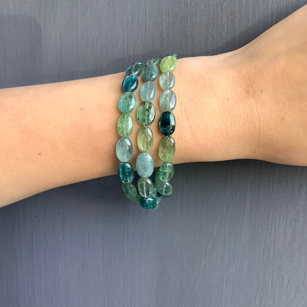 multi kyanite triple strand bracelet on wrist