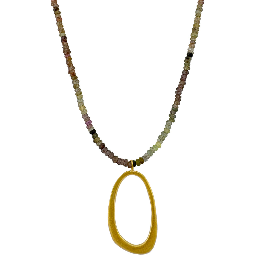 Necklace with multicolored beads and a gold pendant on a white background