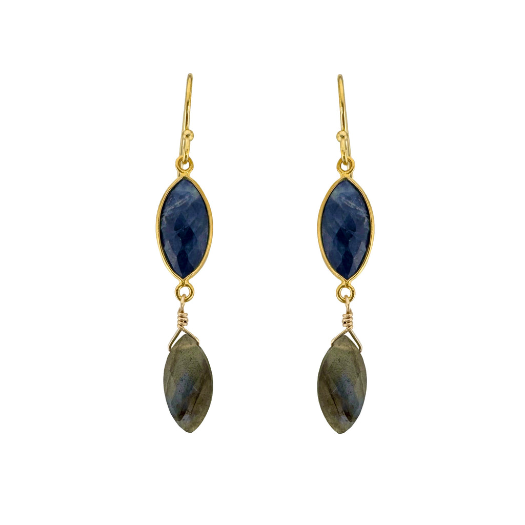 Pair of gold earrings with blue and green stones on a white background