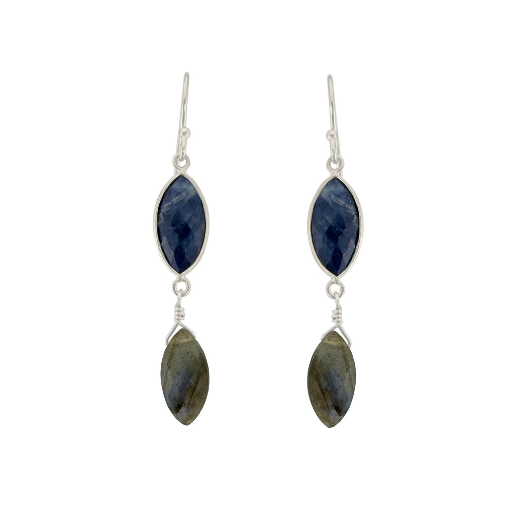 Pair of earrings with blue and green stones on a white background