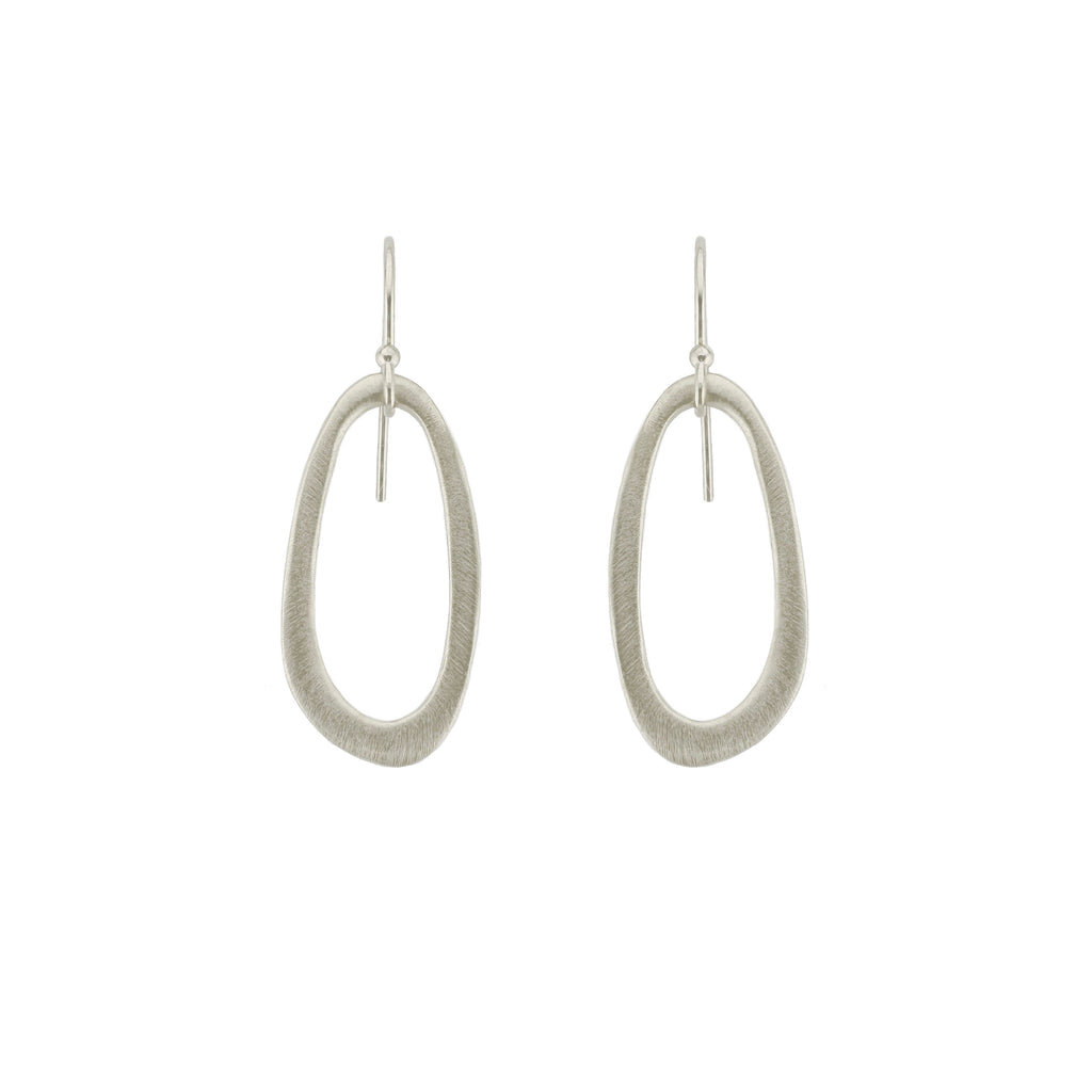 Pair of silver hoop earrings on a white background