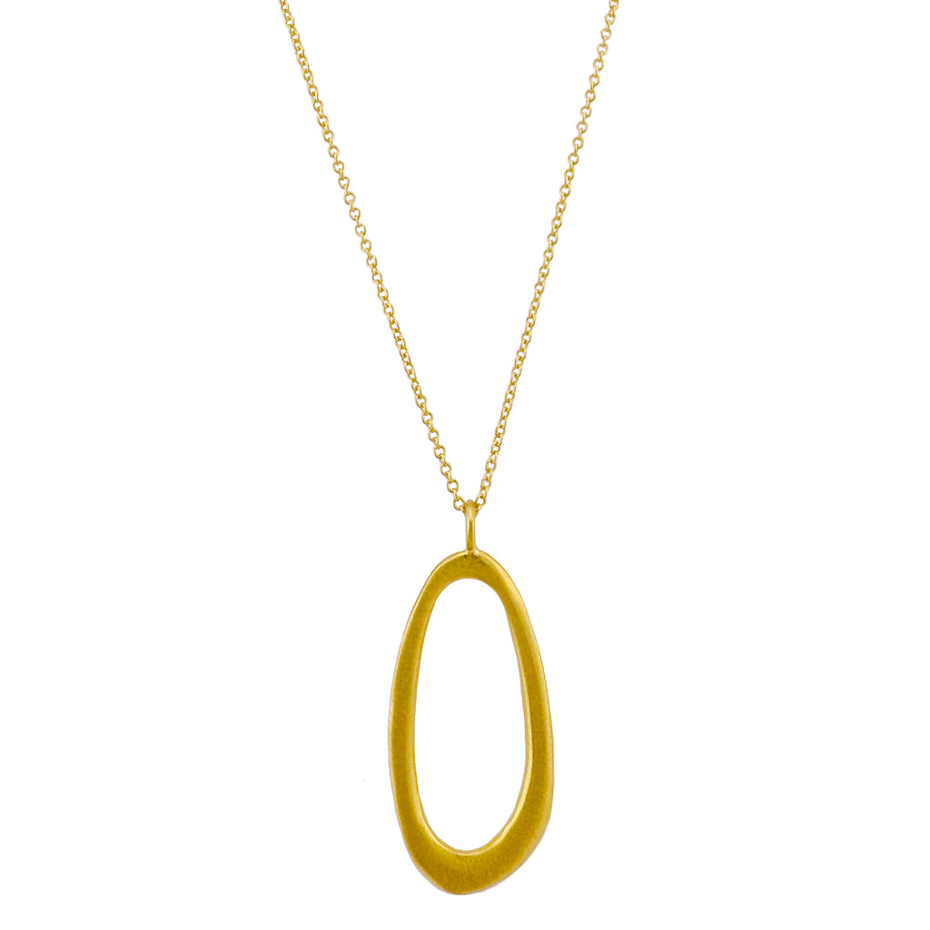 Gold necklace with an oval pendant on a white background