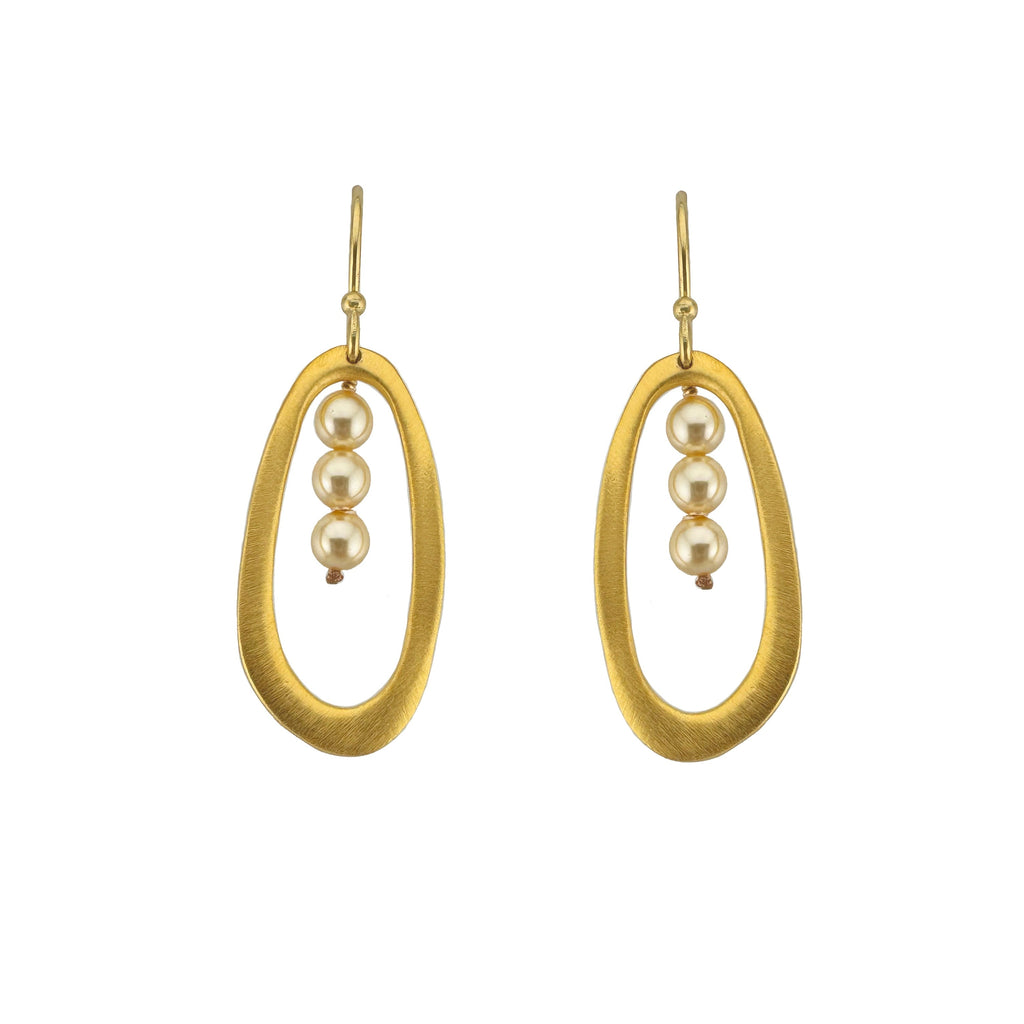 Gold hoop earrings with pearl beads on a white background