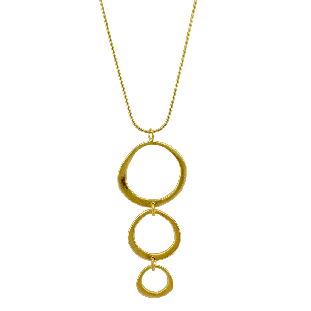 Gold necklace with three interlocking rings on a white background