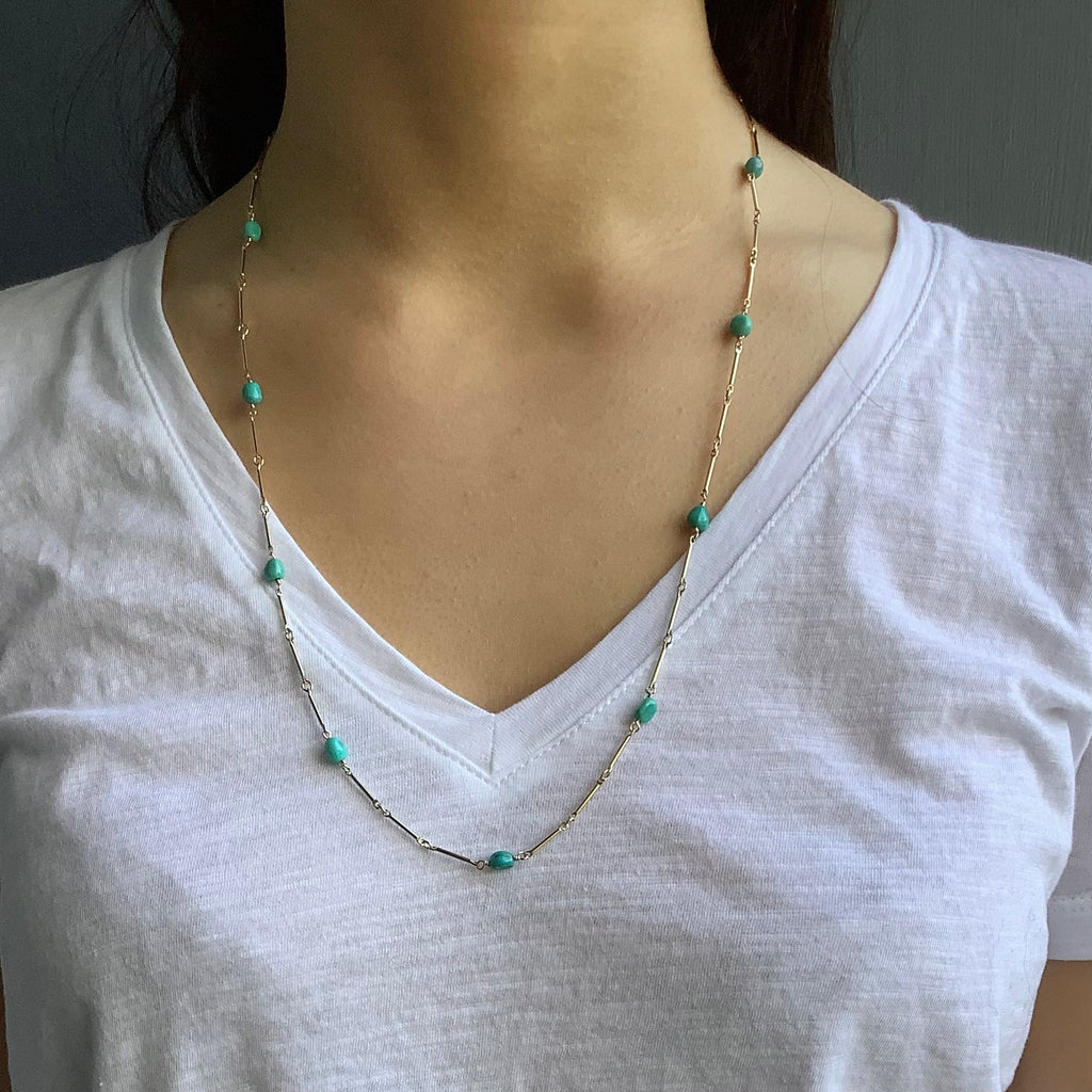 turquoise on 26" chain necklace in on neck