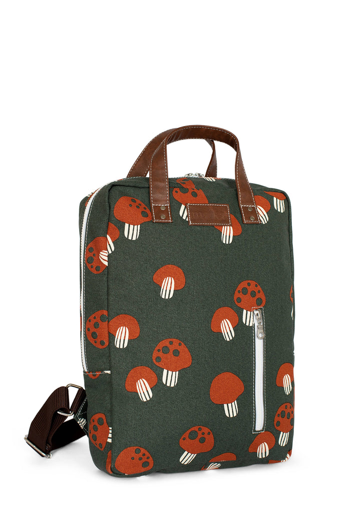 backpack green with red mushrooms and brown straps