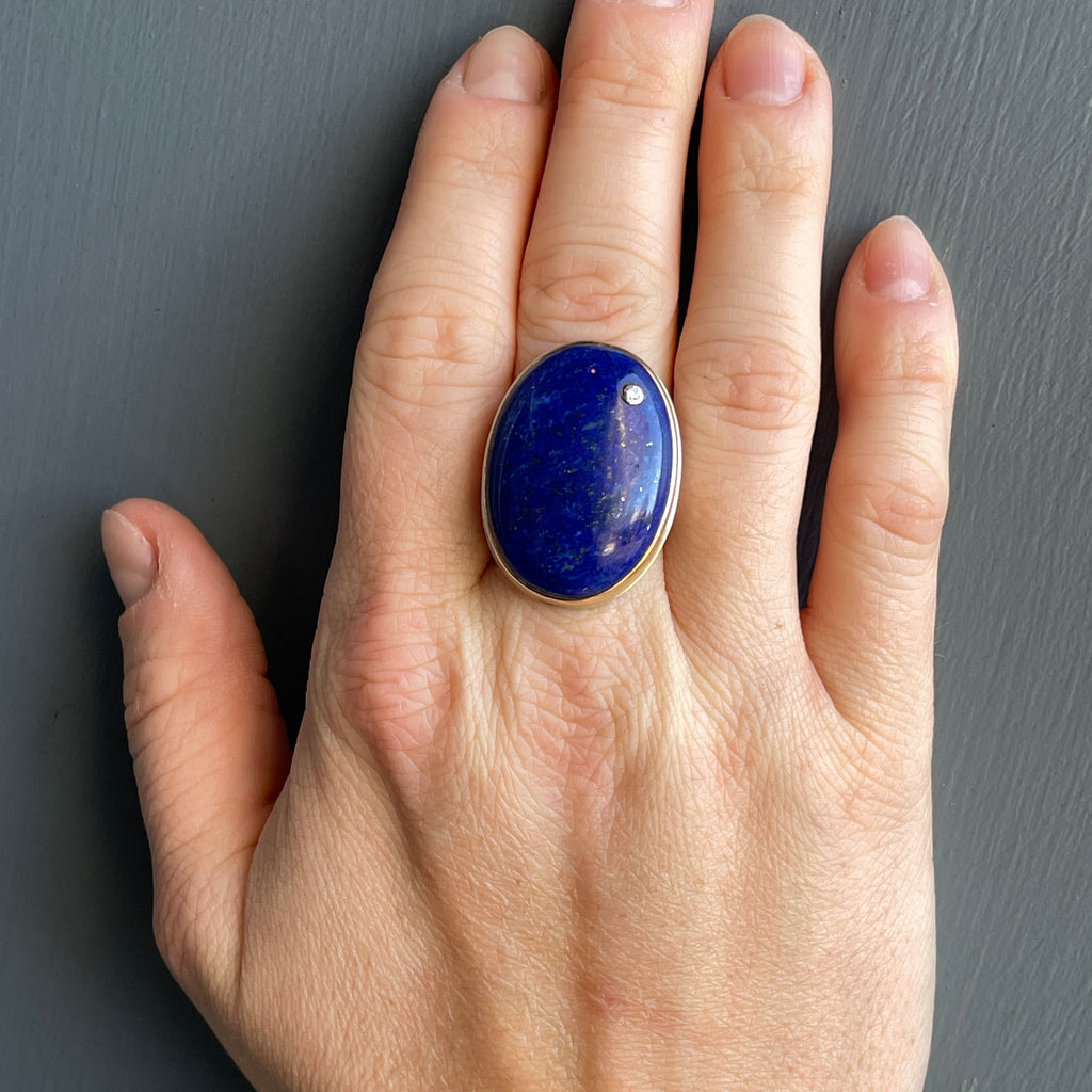 Large Vertical Oval Lapis with Diamond on hand