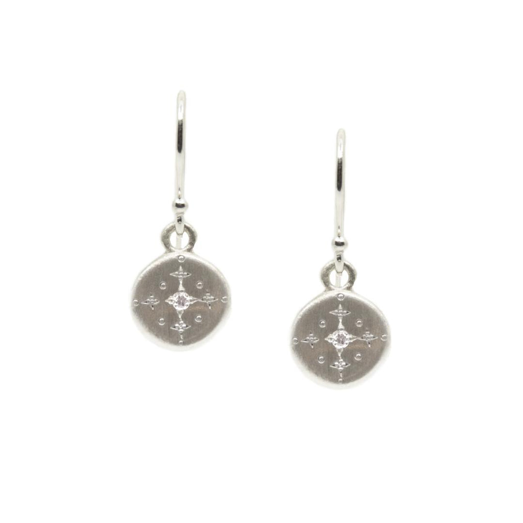 new moon charm earring with diamond front view over a white background