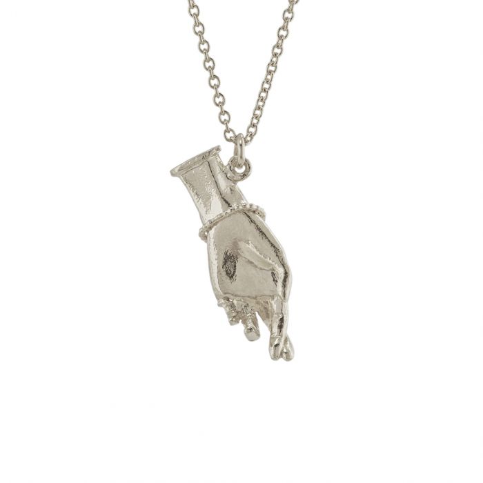 silver pendant necklace, hand with fingers crossed showing inside of hand