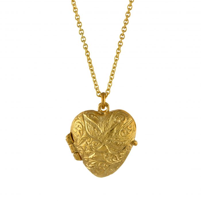 victoriana heart locket over white background