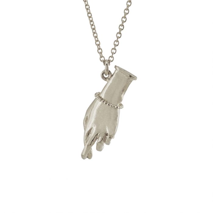 silver pendant necklace featuring hand wearing movable bracelet, with fingers crossed 